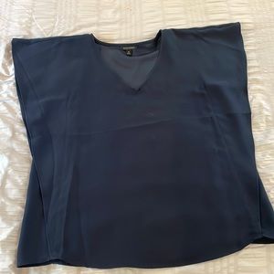 Navy blouse with flutter sleeves